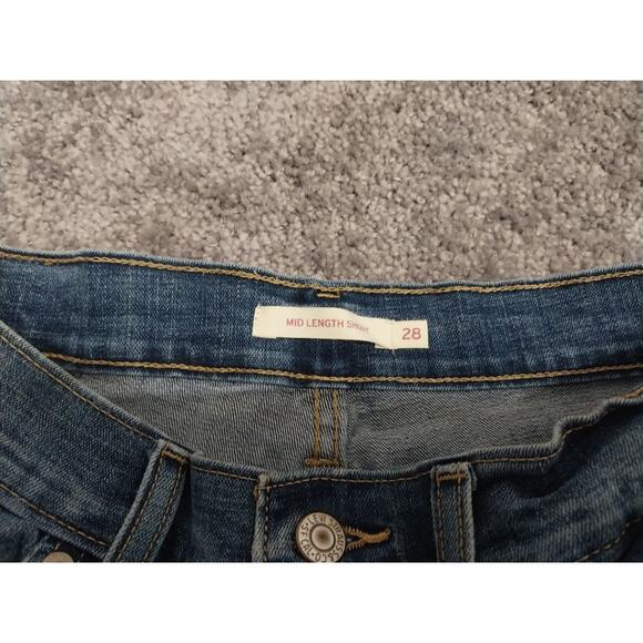 Levi Strauss & Co Womens Size 28 Mid Length Stretch Medium Wash Jean Shorts - Picture 3 of 3